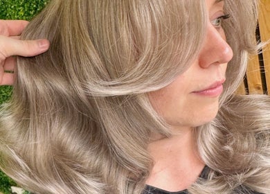 Elegant silver hair styled in waves at STUDIO twenty two, Pontypool, Wales, GB.