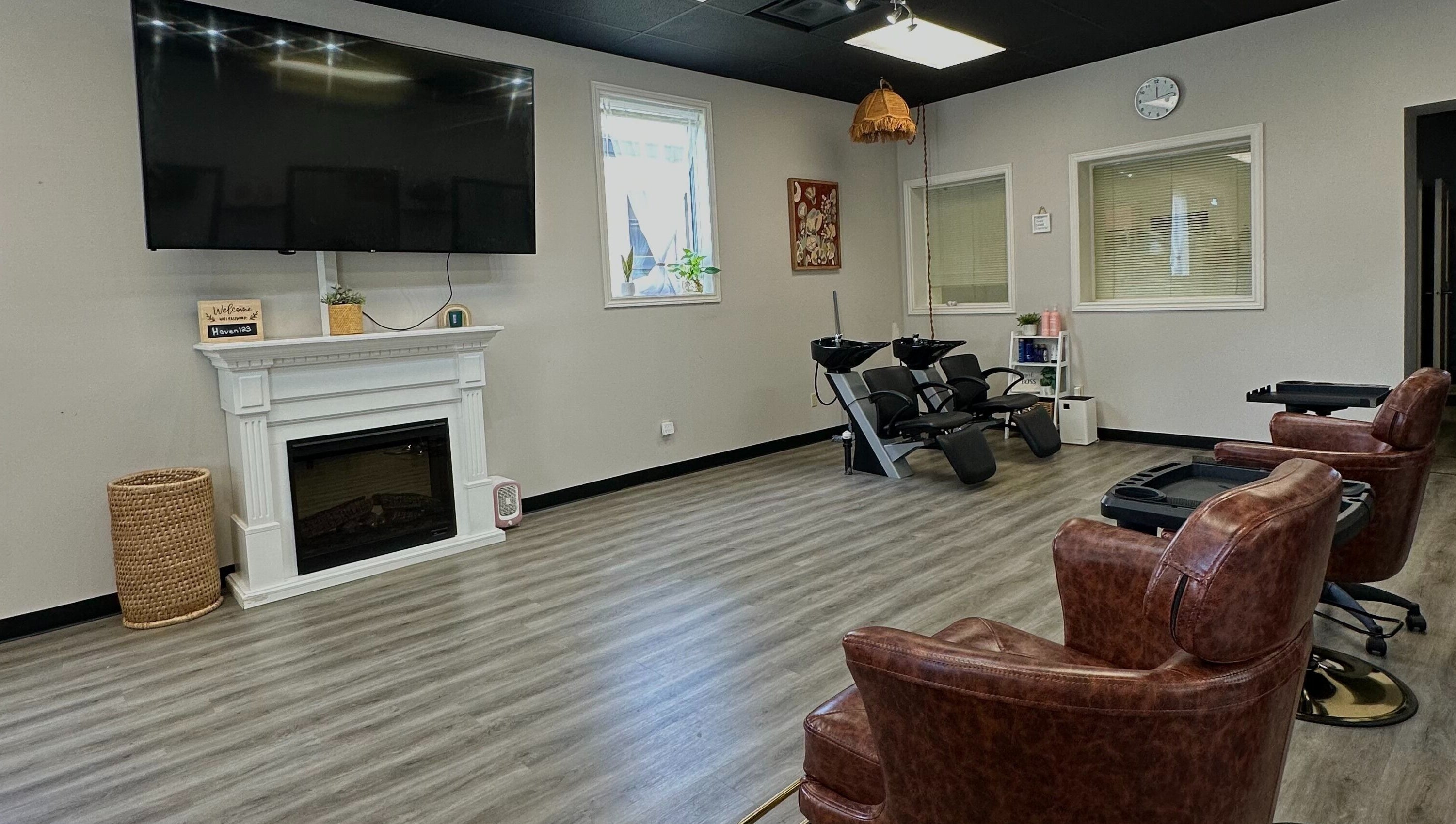 Spacious interior of The Extension Haven in St. Thomas, Ontario, CA, featuring comfortable chairs and modern décor.