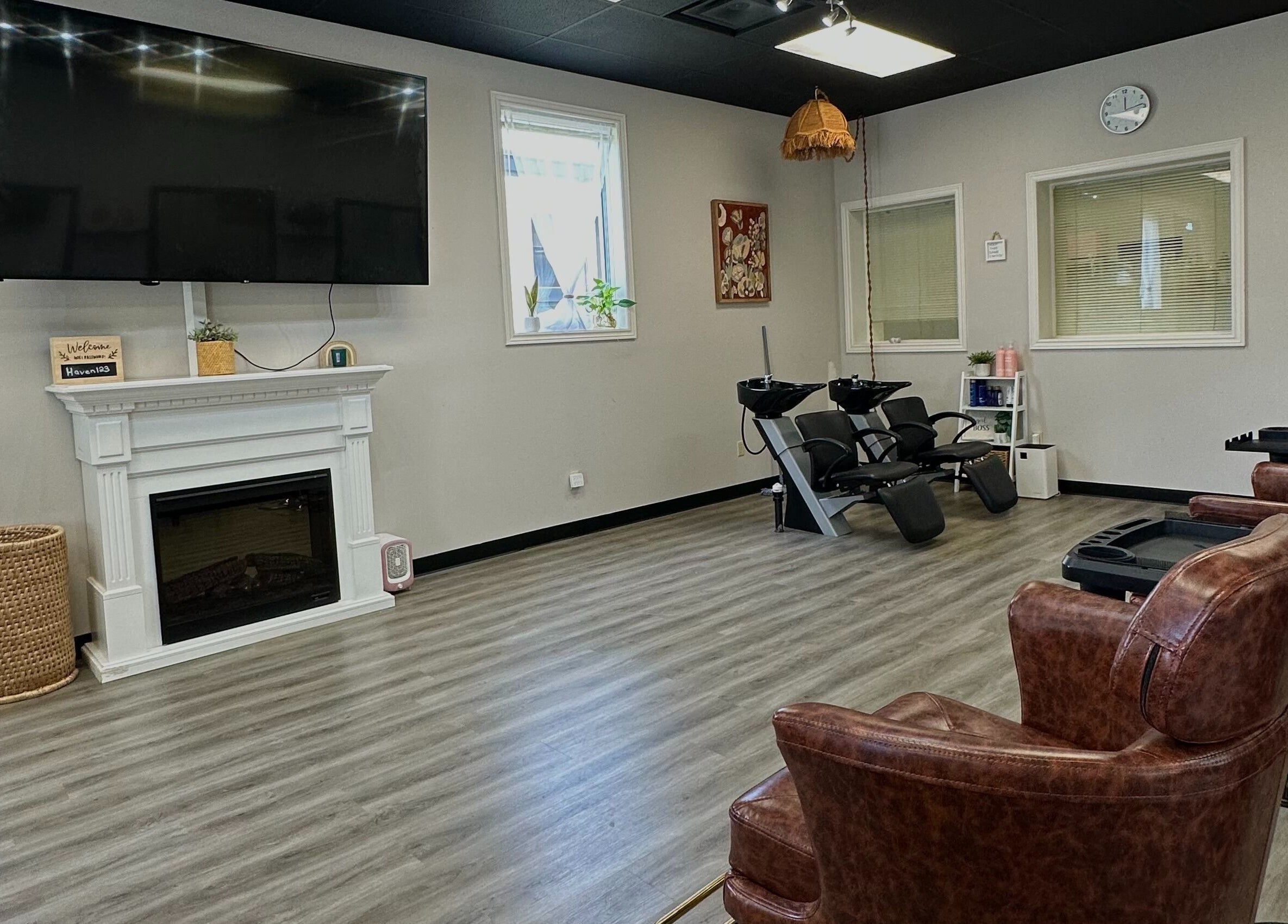 Spacious interior of The Extension Haven in St. Thomas, Ontario, CA, featuring comfortable chairs and modern décor.