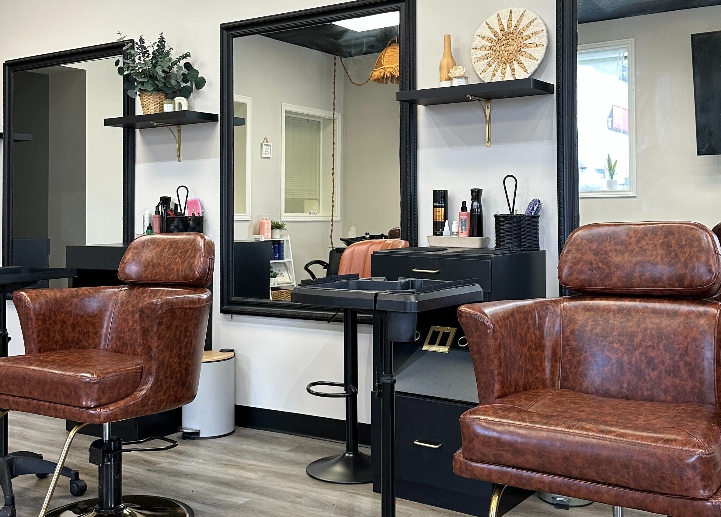 Luxury styling chairs at The Extension Haven, St. Thomas, Ontario, CA showcasing modern salon elegance.