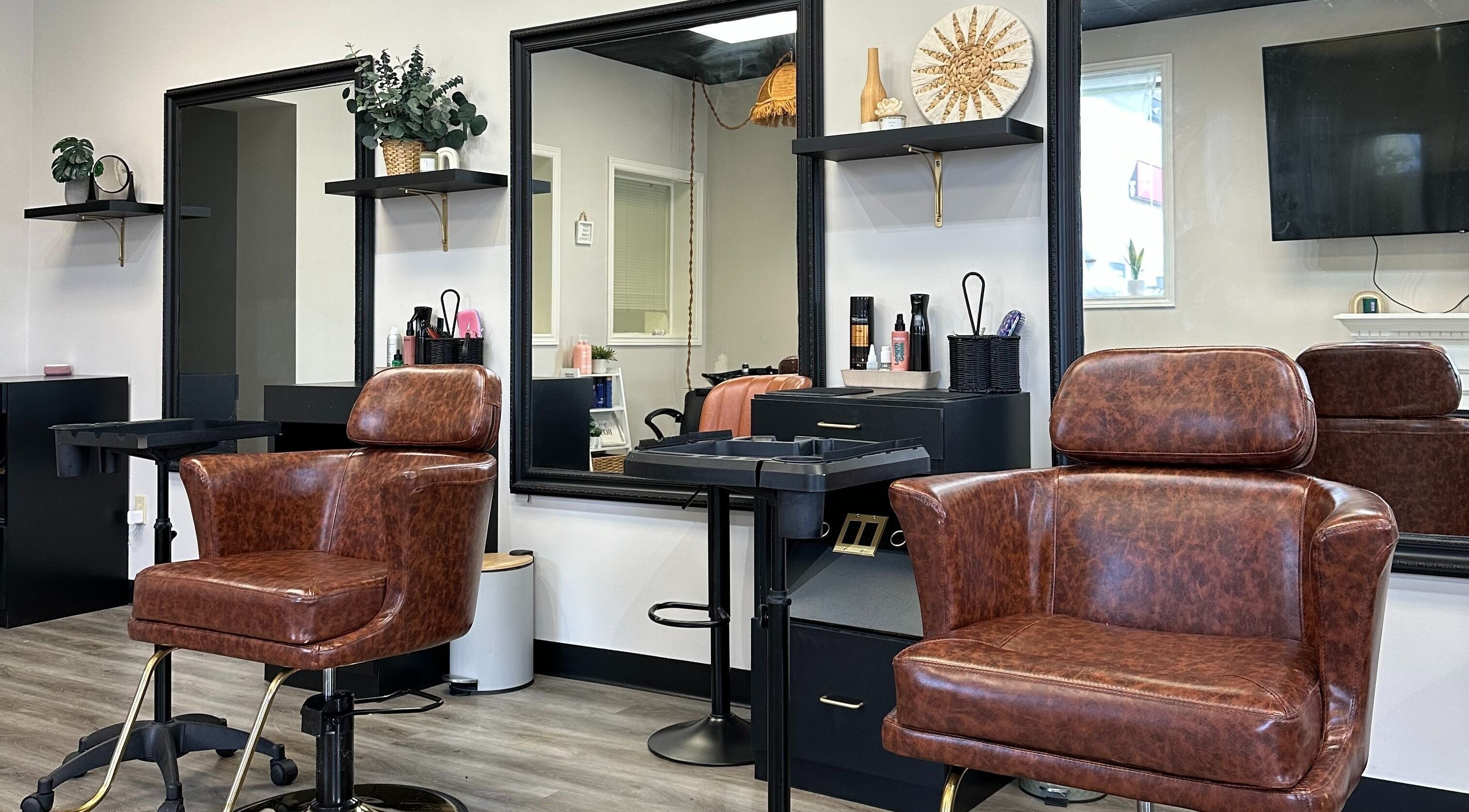 Luxury styling chairs at The Extension Haven, St. Thomas, Ontario, CA showcasing modern salon elegance.