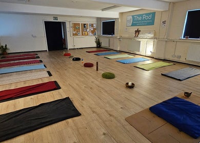 Yoga mats and cushions in a serene room at Pure Turtle Wellbeing at The Pod, Burton Latimer, England, GB.