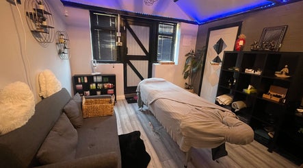 Tranquil room at Massage Essex Holistic Therapy Room in Aveley, England, GB with massage table and calming decor.