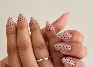 Stylish polka dot nails at Ruby Glow Nails & Beauty Kadıköy, İstanbul, İstanbul, TR. Trendy and chic manicure.