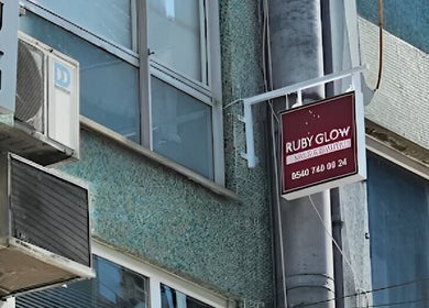 Exterior sign of Ruby Glow Nails & Beauty Kadıköy in İstanbul, İstanbul, TR, on a building facade.
