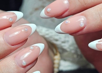 Elegant pearl-tipped French manicure at Ruby Glow Nails & Beauty Kadıköy, İstanbul, İstanbul, TR.