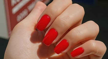 Vibrant red manicure at Ruby Glow Nails & Beauty Kadıköy, İstanbul, İstanbul, TR offers chic nail designs.
