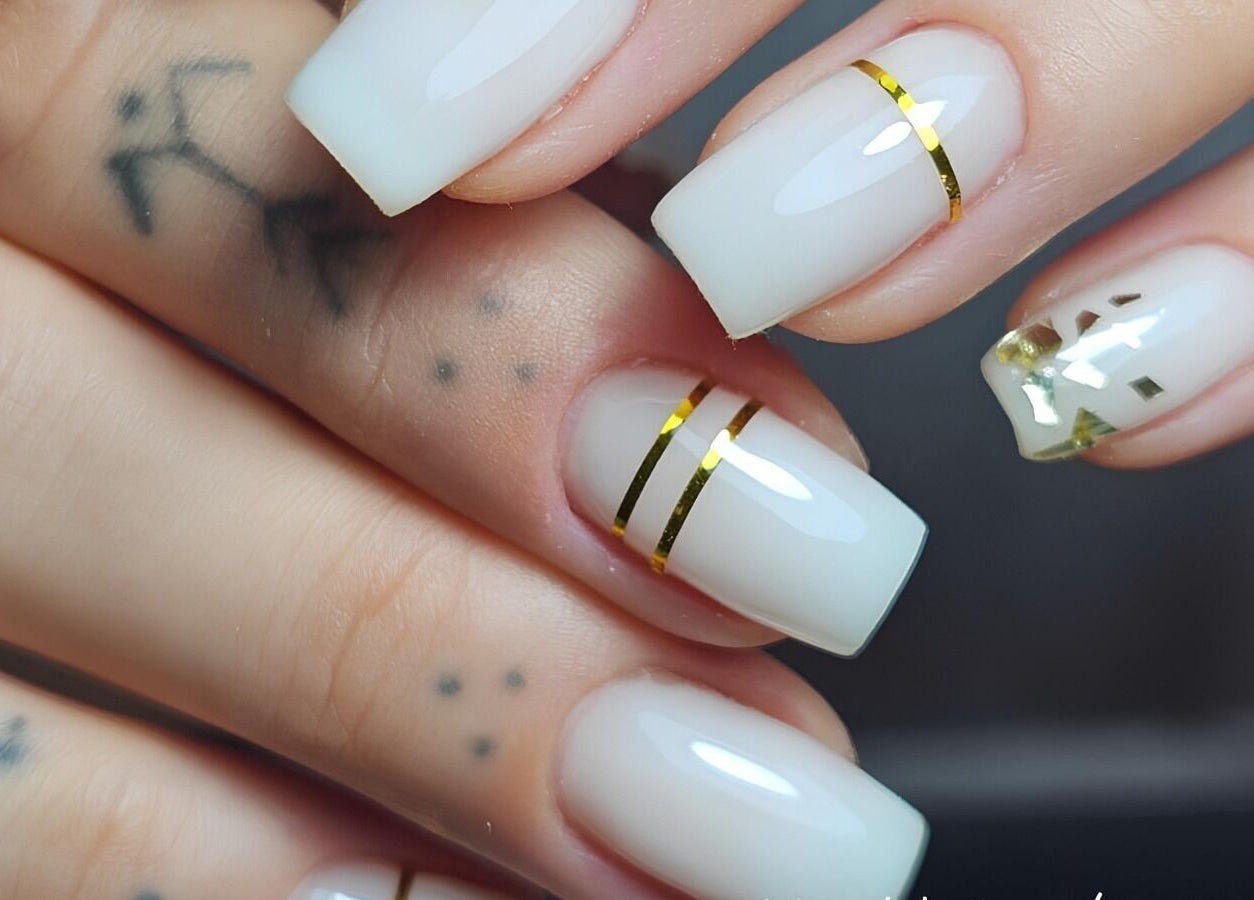Elegant nail art at Ruby Glow Nails & Beauty Kadıköy, İstanbul, İstanbul, TR featuring gold accents.