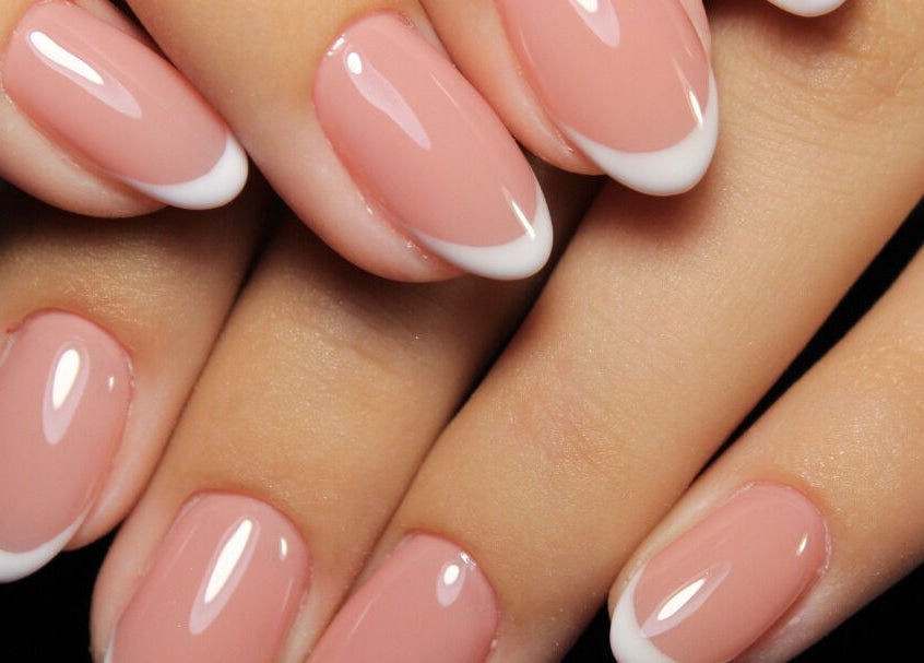 Classic French manicure at Ruby Glow Nails & Beauty Kadıköy, İstanbul, İstanbul, TR. Sleek and polished nails.
