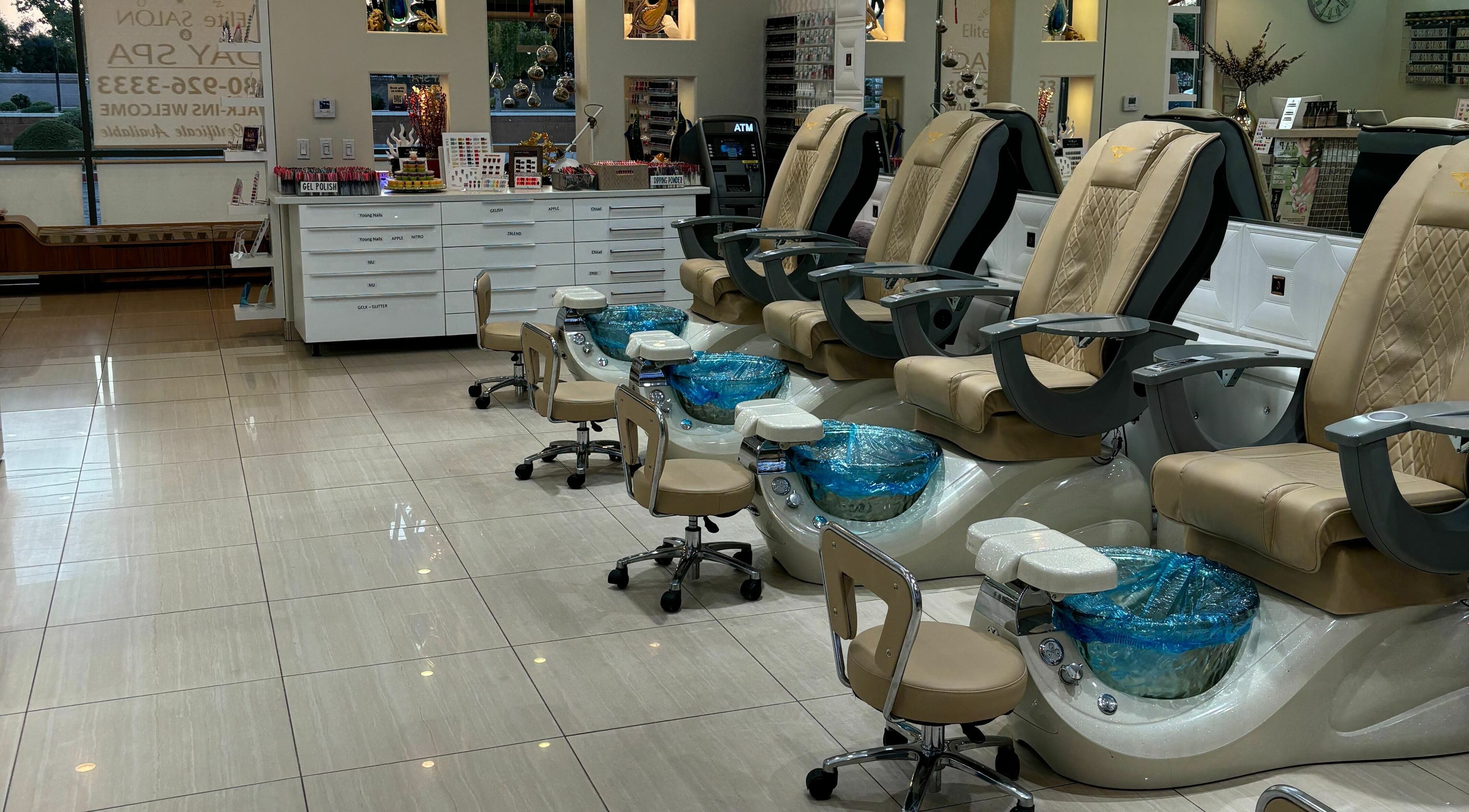 Luxurious pedicure chairs at Elite Salon and Day Spa, Gilbert, Arizona, US, showcasing a serene ambiance.