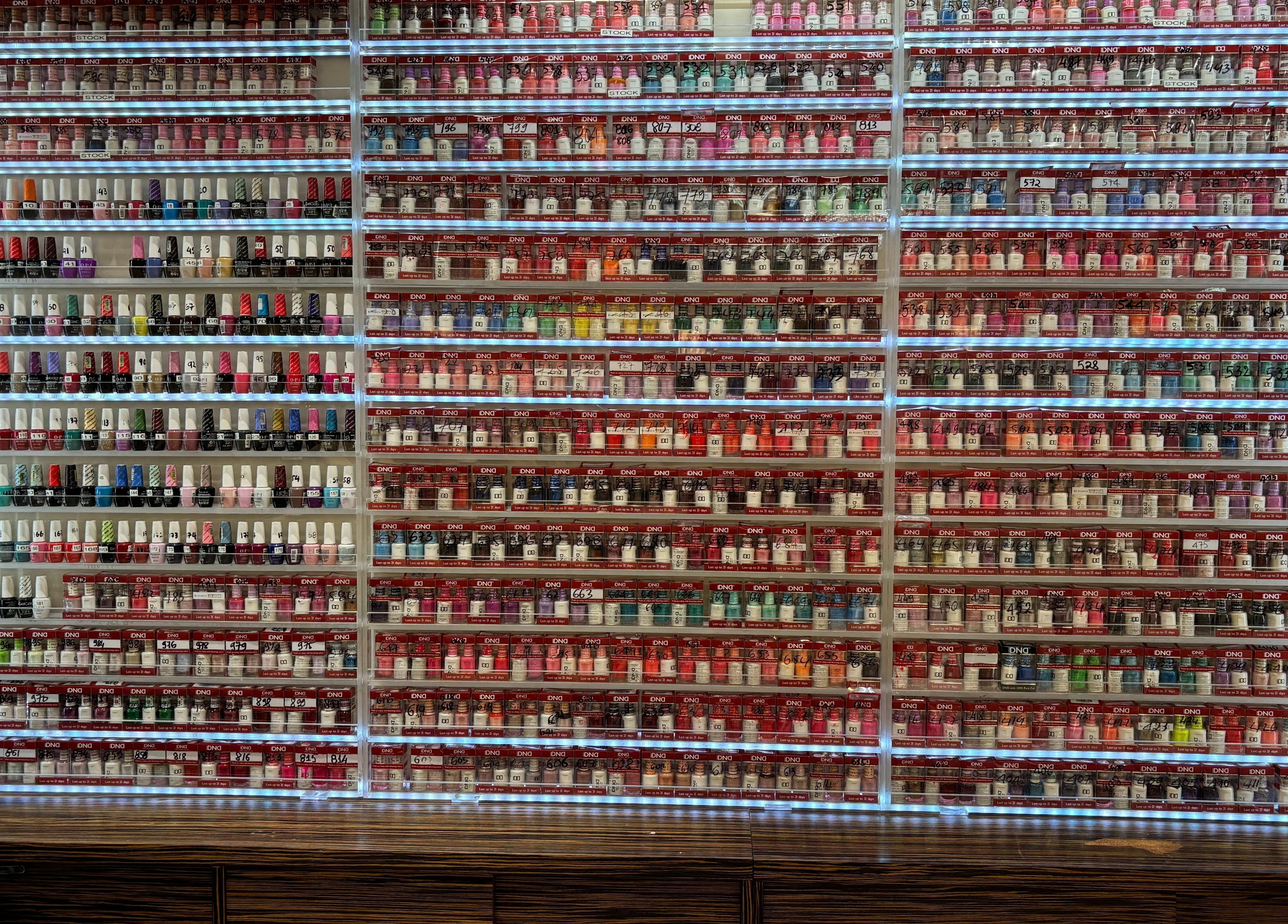 Vibrant nail polish display at Elite Salon and Day Spa in Gilbert, Arizona, US.