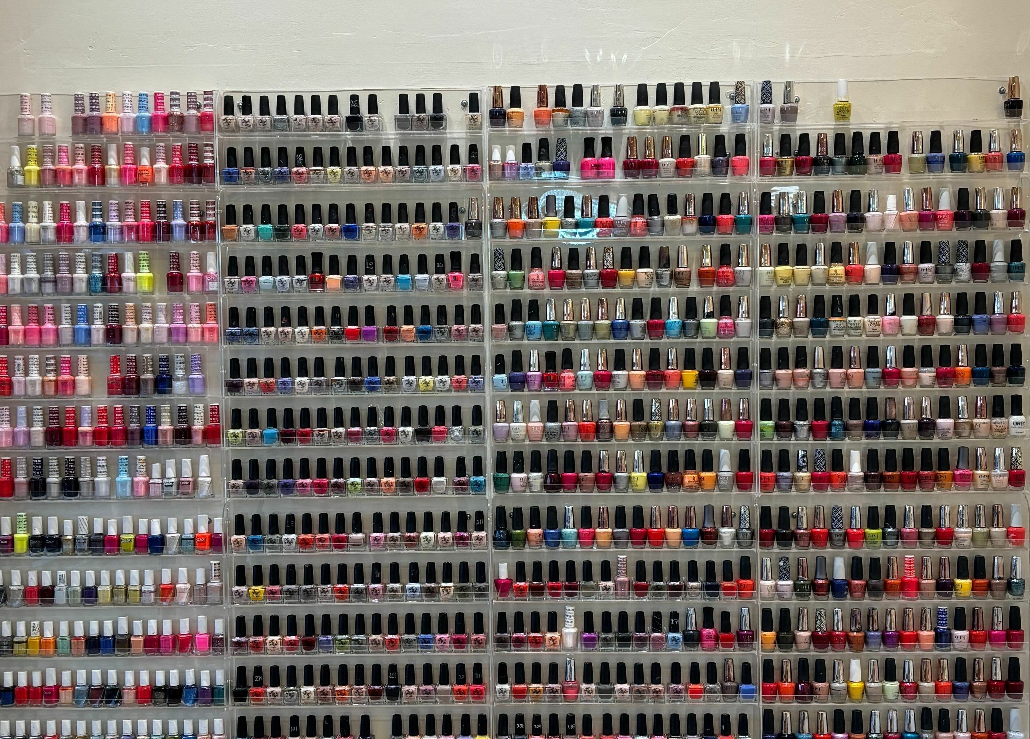 Vibrant nail polish selection at Elite Salon and Day Spa, Gilbert, Arizona, US.