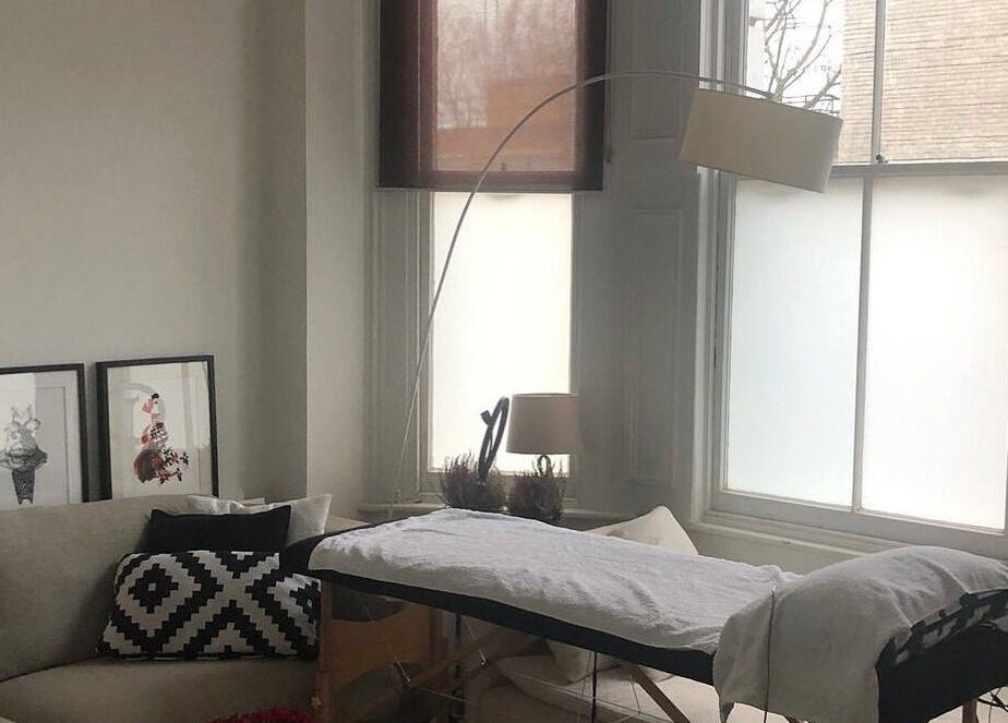 Tranquil massage room at Casa Prado Mobile, London, England, GB, offering a serene beauty and wellness experience.