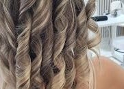 Stylishly curled hair at Enana Ladies Beauty Salon, Dubai, Dubai, AE, showcasing expert styling services.
