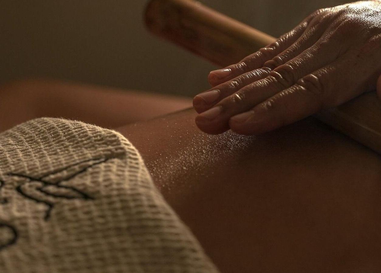 Relaxing massage at SOLO, Ajman, Ajman, AE, showcasing a comforting spa experience.