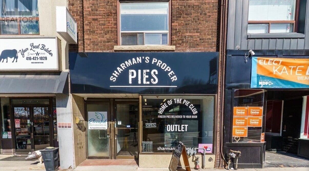 Discover the inviting front of Sharman's Proper Pies next to Royal Eden Spa in Toronto, Ontario, CA.