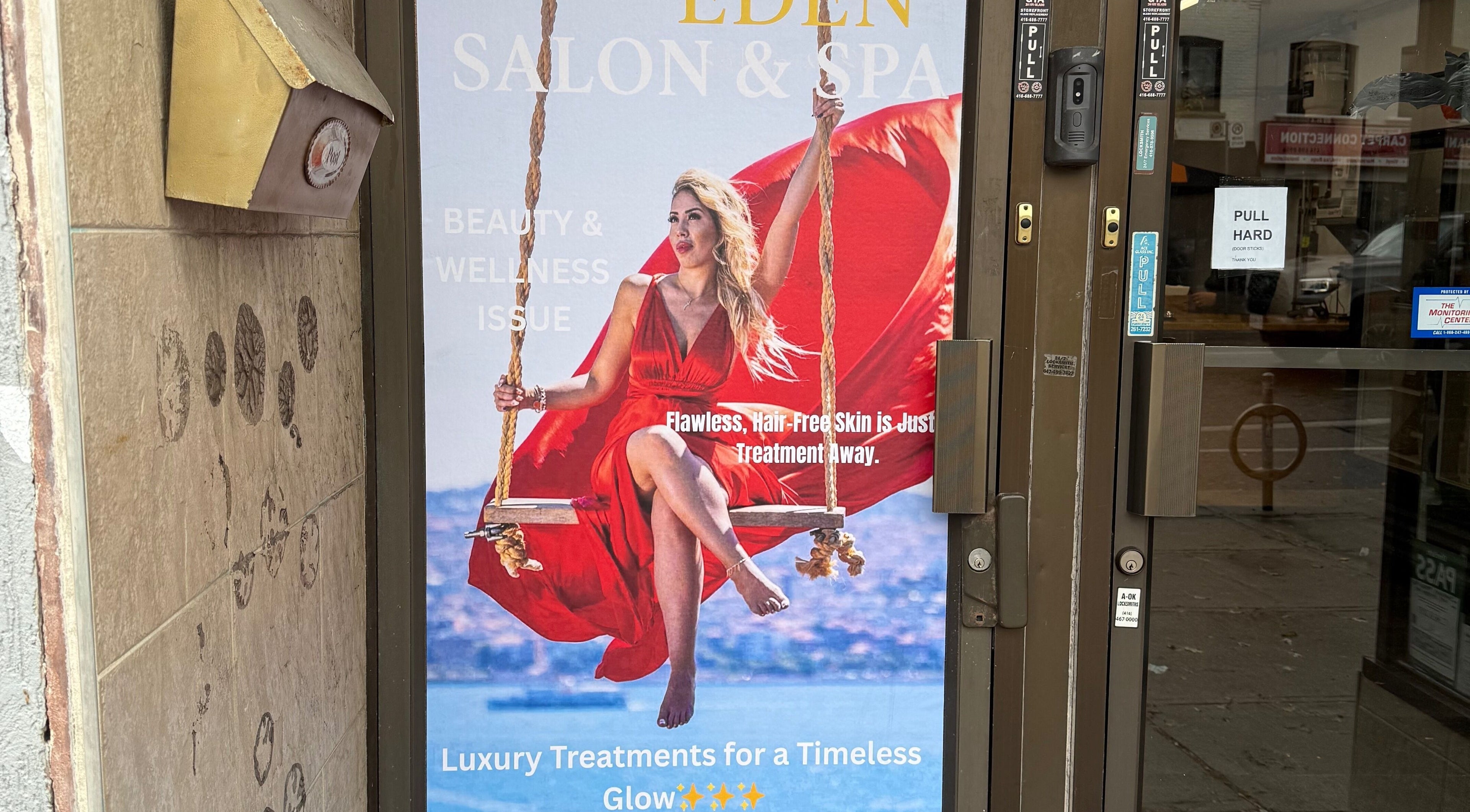 Royal Eden Spa entrance in Toronto, Ontario, CA. Elegant woman on a swing in a red dress, promoting luxury treatments.