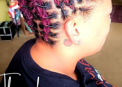 Beautiful purple twisted hairstyle at Nurishin Knotts, Charlotte, North Carolina, US.