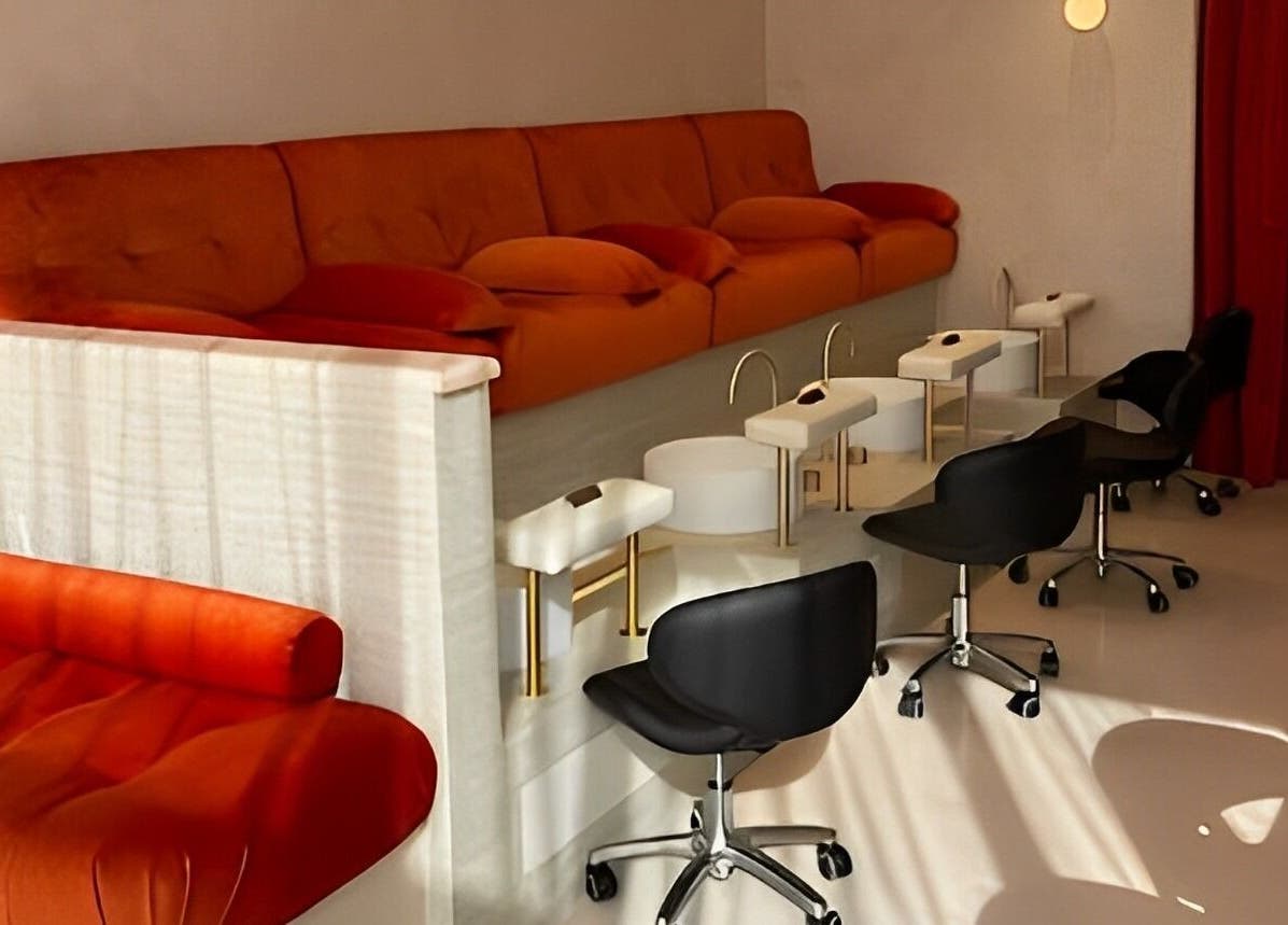 Cozy nail lounge at 1999 House of Nails - Ferrymead in Christchurch, Canterbury, NZ with plush seats and sleek furnitures.