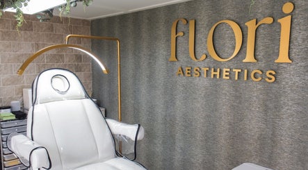 Modern treatment room at Flori Aesthetics, Whittlesey, England, GB with stylish decor and comfortable chair.