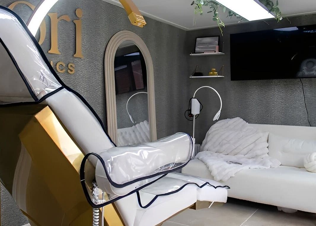 Luxury treatment room at Flori Aesthetics Whittlesey, Whittlesey, England, GB, featuring plush seating and decor.