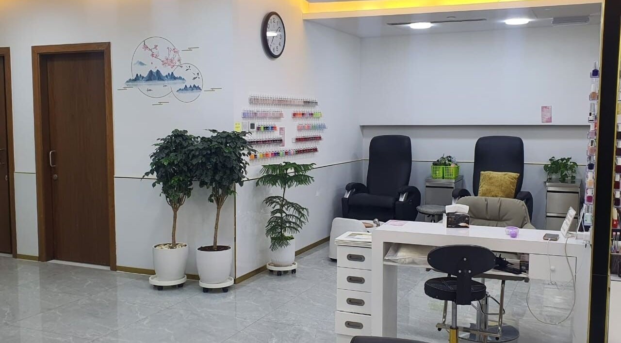 Relaxing interior at Companion Beauty Salon and Spa Khalidiyah Mall, Abu Dhabi, AE with nail care area.