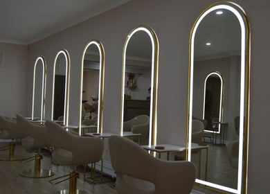 Chic salon mirrors at Lounais - Formerly Guys and Dolls, Burton Upon Trent, England, GB with stylish seating.
