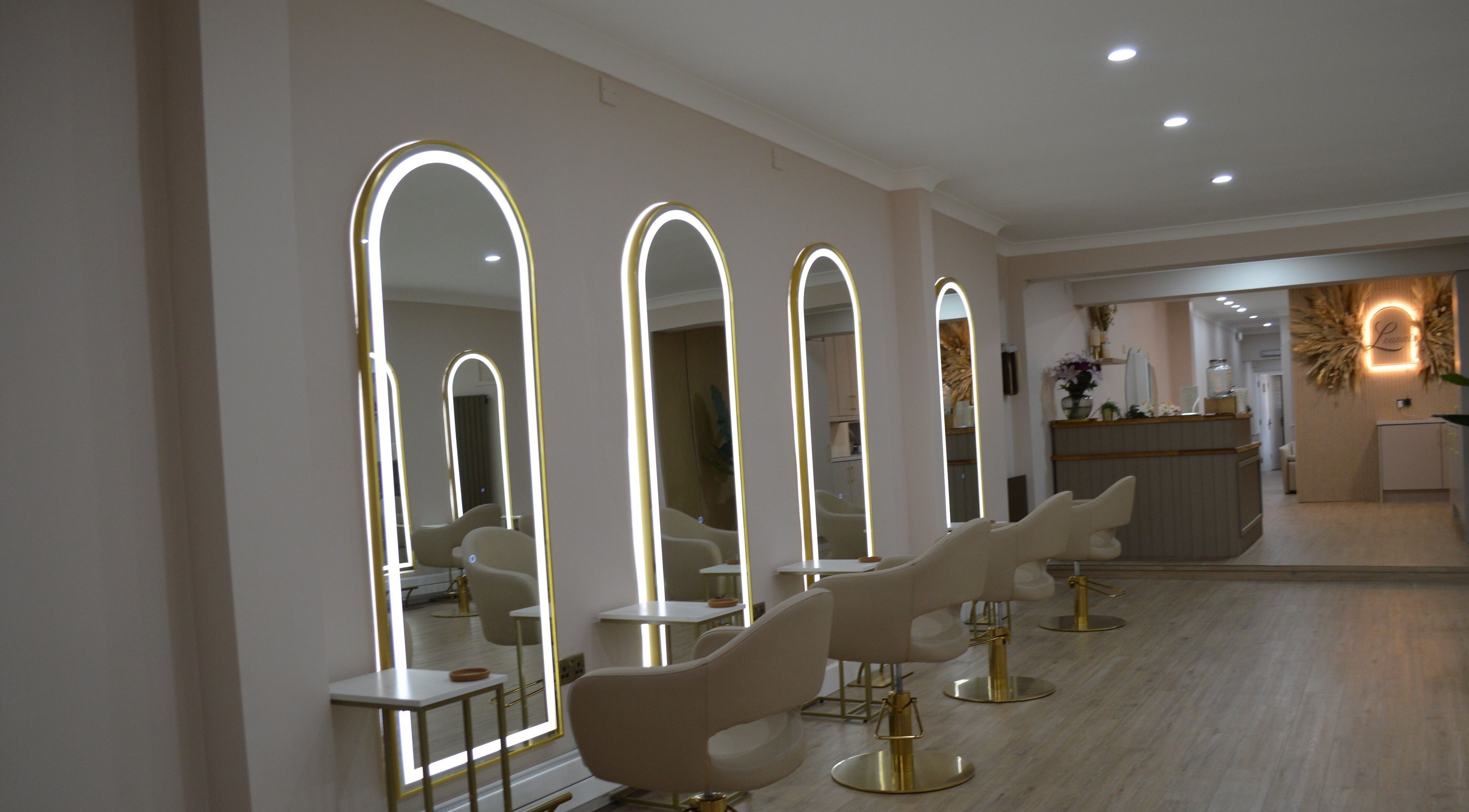 Chic beauty salon interior with modern lighting at Lounais - Formerly Guys and Dolls, Burton Upon Trent, England, GB.