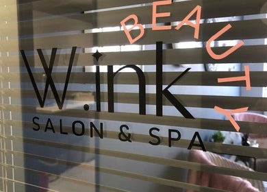 Entrance of Wink Beauty Salon & Spa at Sandton, Gauteng, ZA with stylish interior glimpses.