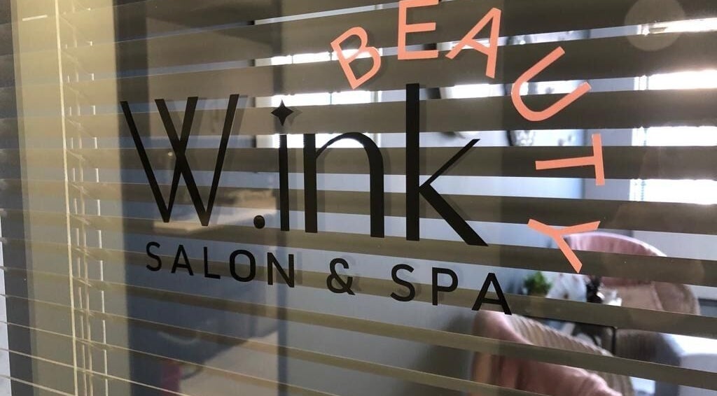 Entrance of Wink Beauty Salon & Spa at Sandton, Gauteng, ZA with stylish interior glimpses.