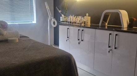 Relaxing treatment room at Wink Beauty Salon & Spa, Sandton, Gauteng, ZA with modern decor and beauty equipment.
