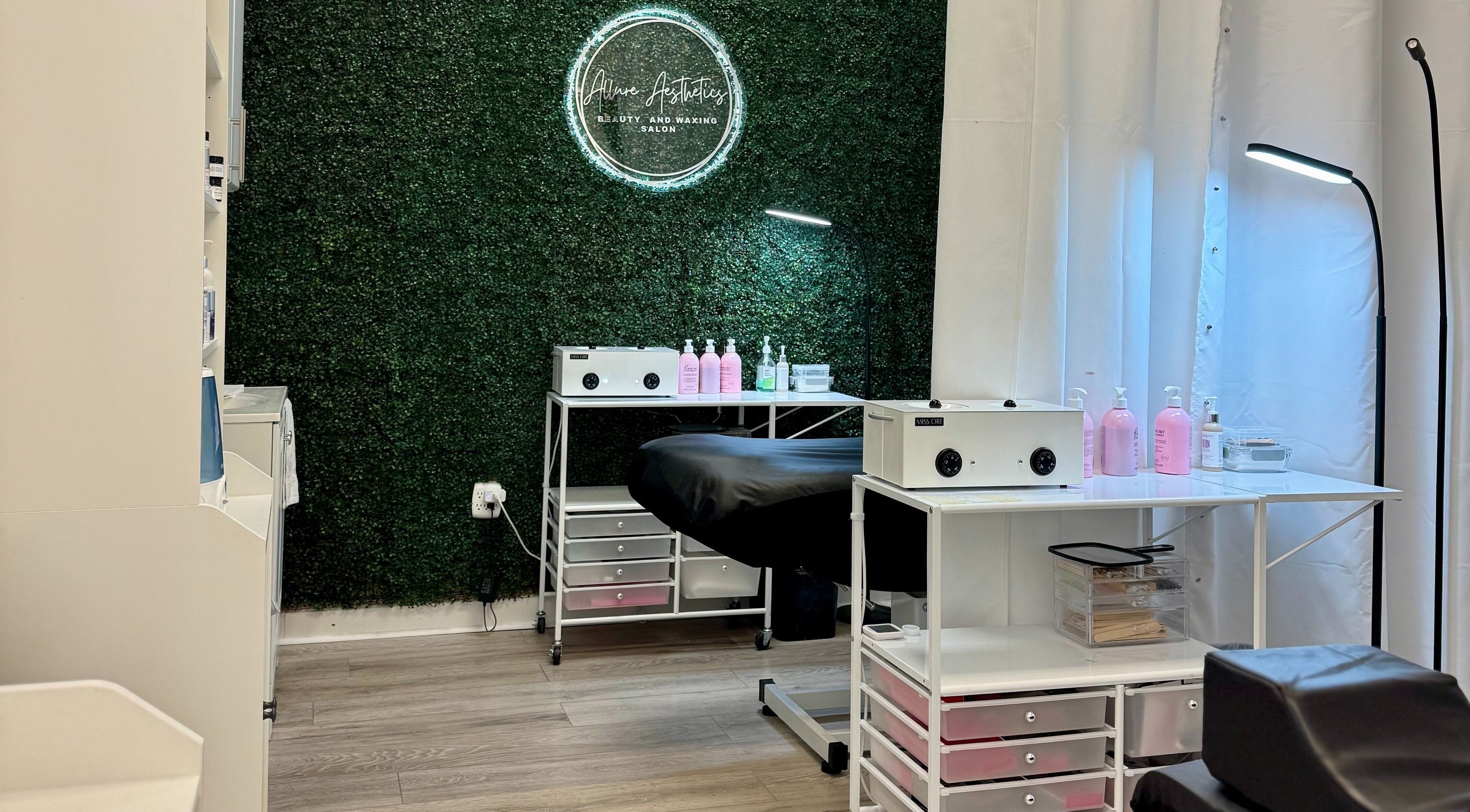 Modern treatment room at Allure Aesthetics Beauty and Waxing Salon, Gilbert, Arizona, US with sleek decor.