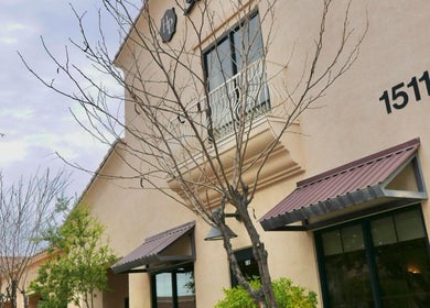 Exterior of Allure Aesthetics Beauty and Waxing Salon at 1511 Gilbert, Arizona, US with modern design elements.