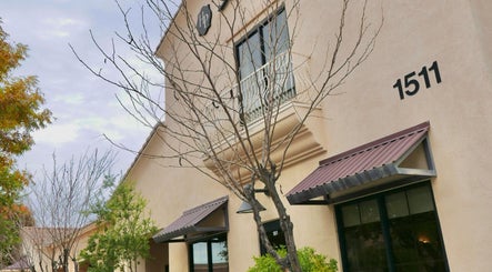 Exterior of Allure Aesthetics Beauty and Waxing Salon at 1511 Gilbert, Arizona, US with modern design elements.