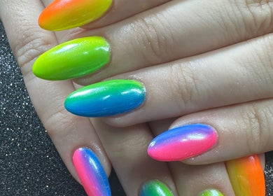 Colorful gradient nails at Emi Nail Art, Gibraltar, GI showcasing vibrant nail design.