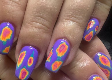 Colorful nail art with purple and neon designs at Emi Nail Art, Gibraltar, GI.
