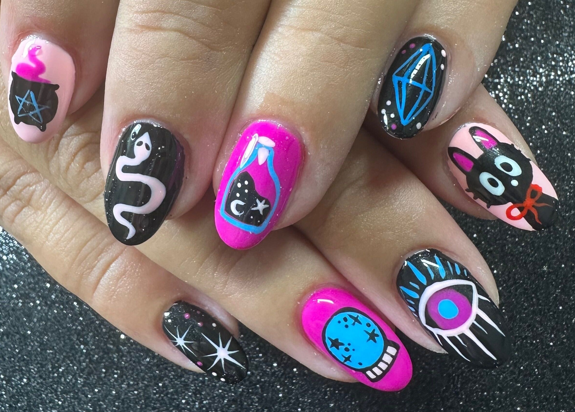 Intricate, colorful nail designs at Emi Nail Art, Gibraltar, GI. Unique and vibrant manicure styles displayed.