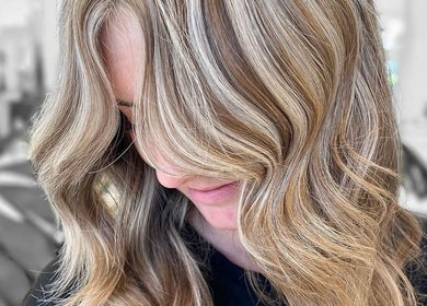 Stylish wavy blonde hair at Vivid Hair Studio, Antigonish, Nova Scotia, CA.