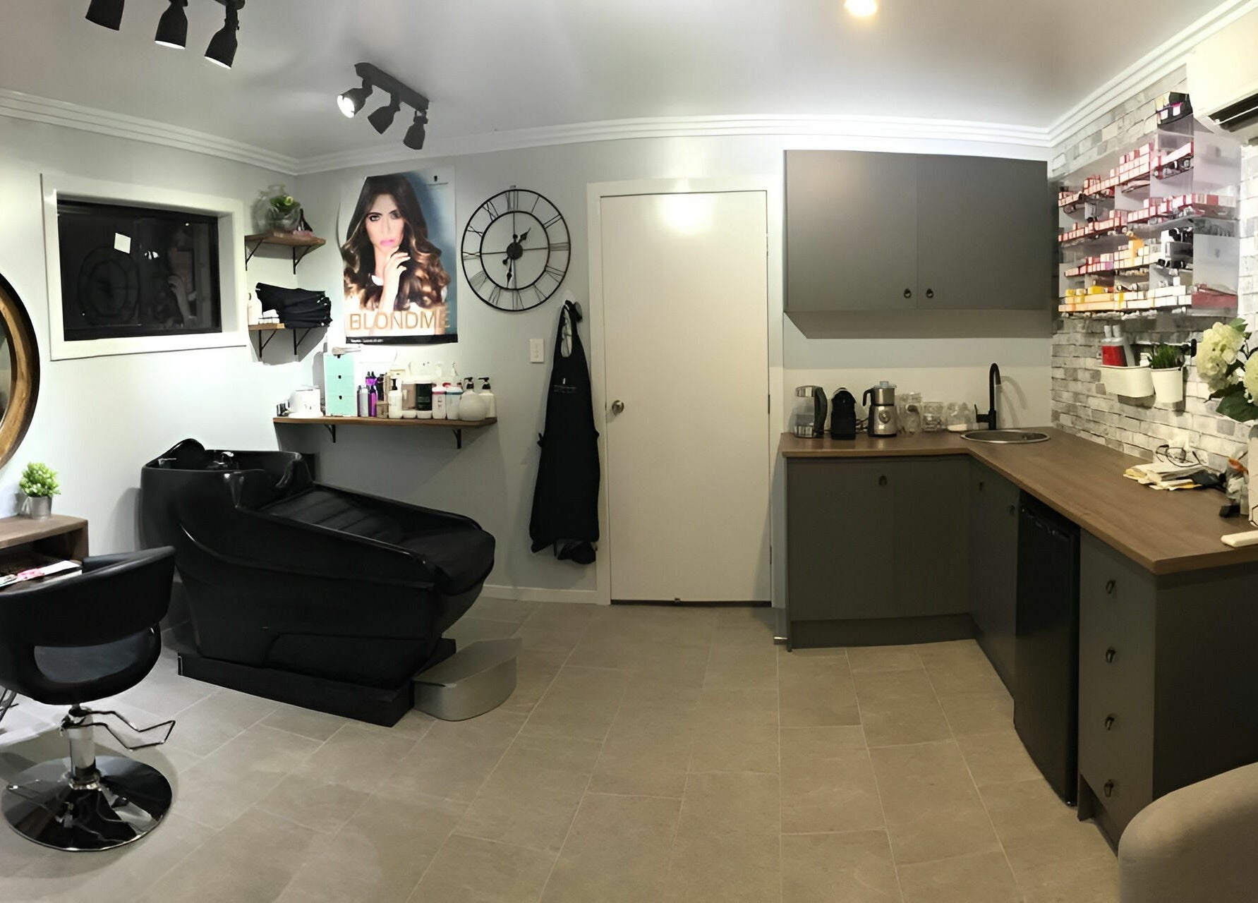 Modern salon interior at Rachael's House of Colour, Stapylton, QLD, AU featuring elegant chairs and beauty products.