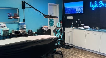 Modern treatment room at Lyla Brows & Beauty, Deerfield Beach, Florida, US, featuring stylish equipment and decor.