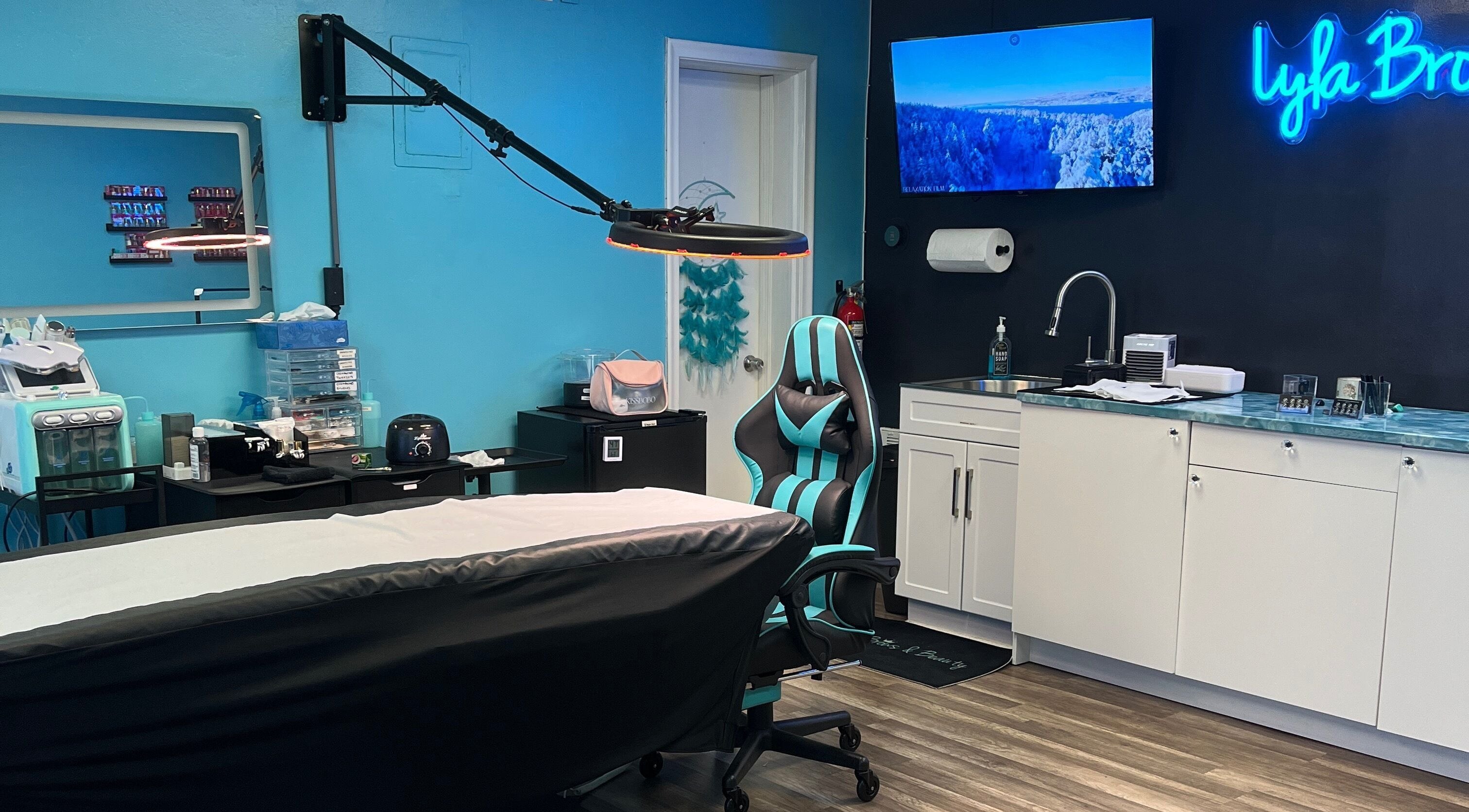 Elegant treatment room at Lyla Brows & Beauty in Deerfield Beach, Florida, US, showcasing modern decor and equipment.