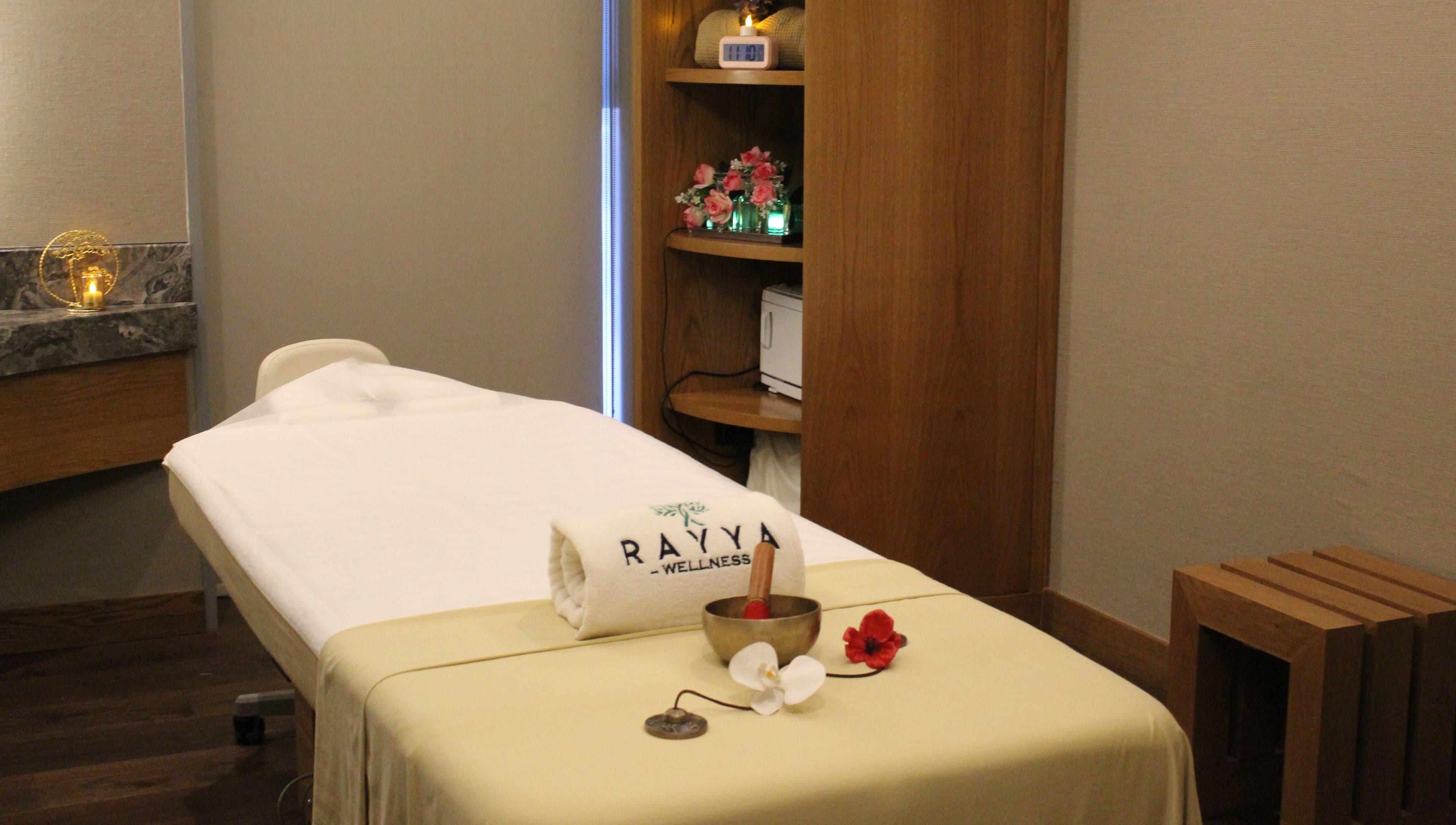 Serene spa room at Rayya Wellness, the First Collection | Business Bay, Dubai, Dubai, AE with massage table.