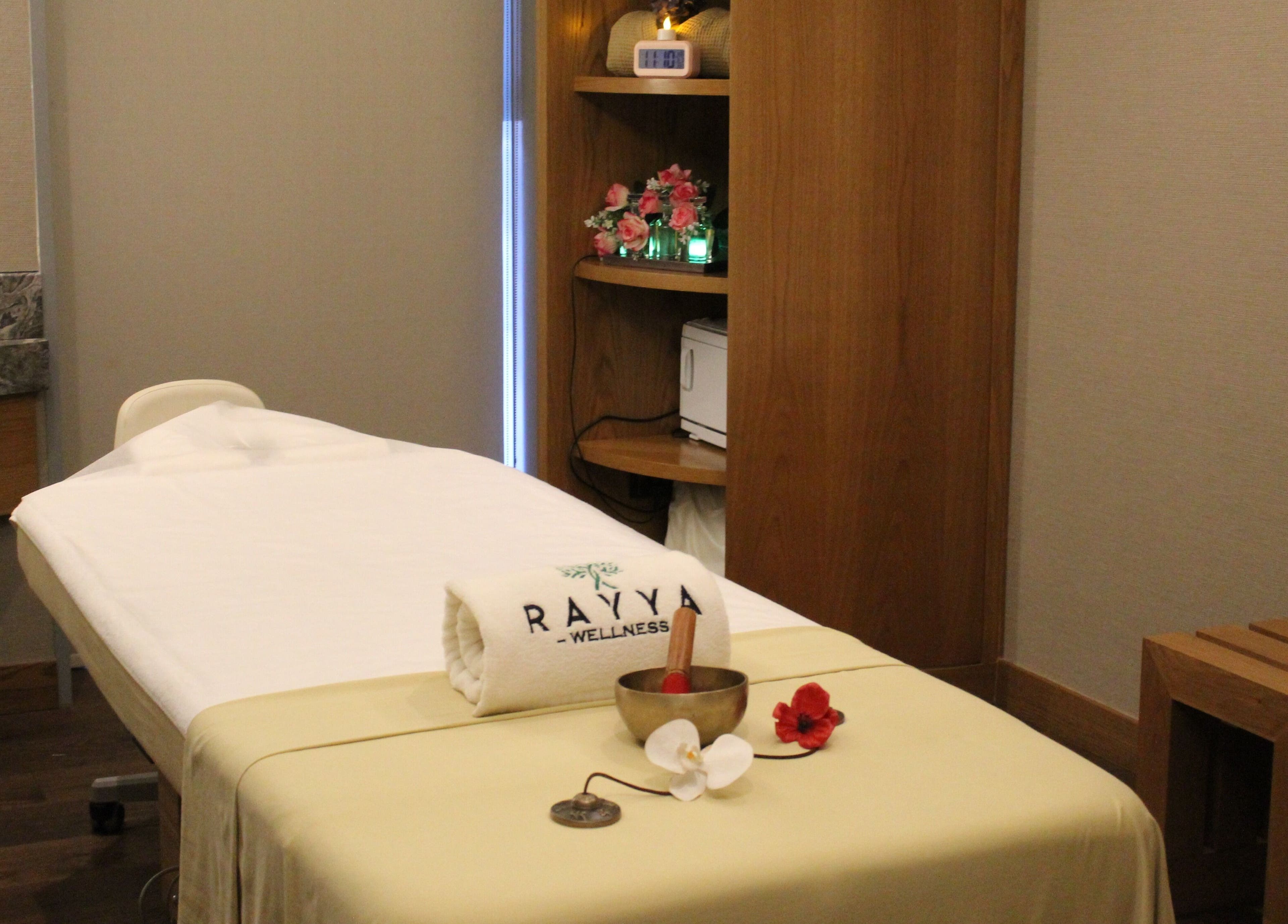 Serene spa room at Rayya Wellness, the First Collection | Business Bay, Dubai, Dubai, AE with massage table.