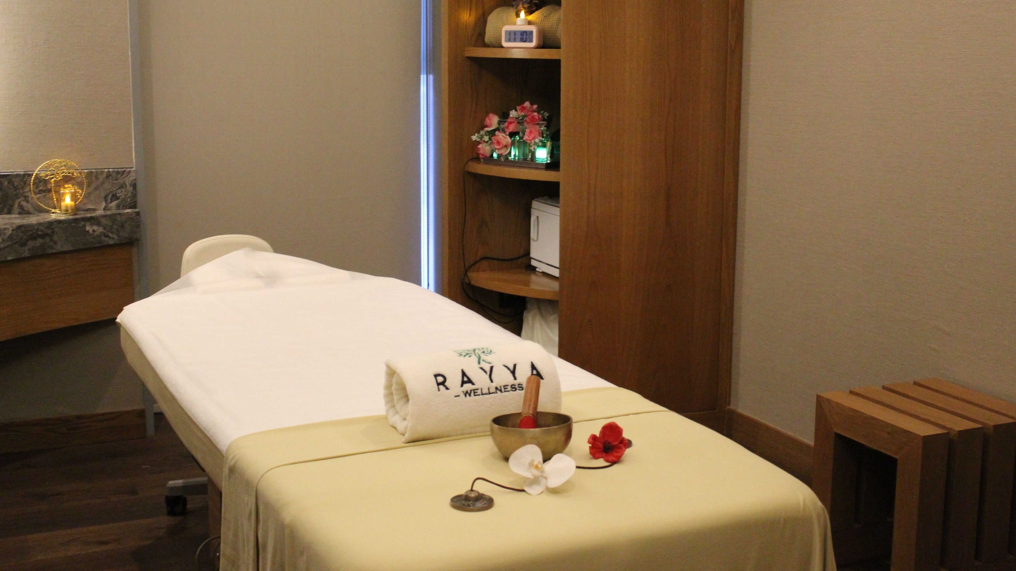 Serene spa room at Rayya Wellness, the First Collection | Business Bay, Dubai, Dubai, AE with massage table.