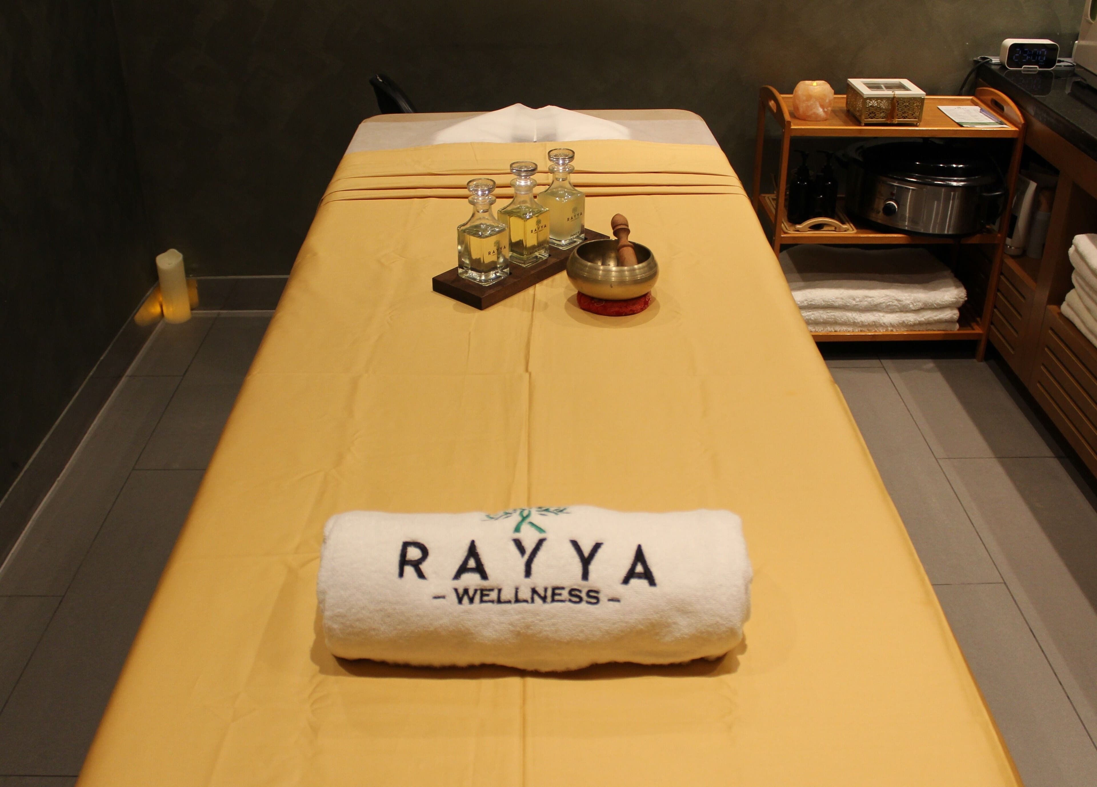 Tranquil massage room at Rayya Wellness | TRYP, Al Saef, Dubai, AE with inviting treatment table setup.