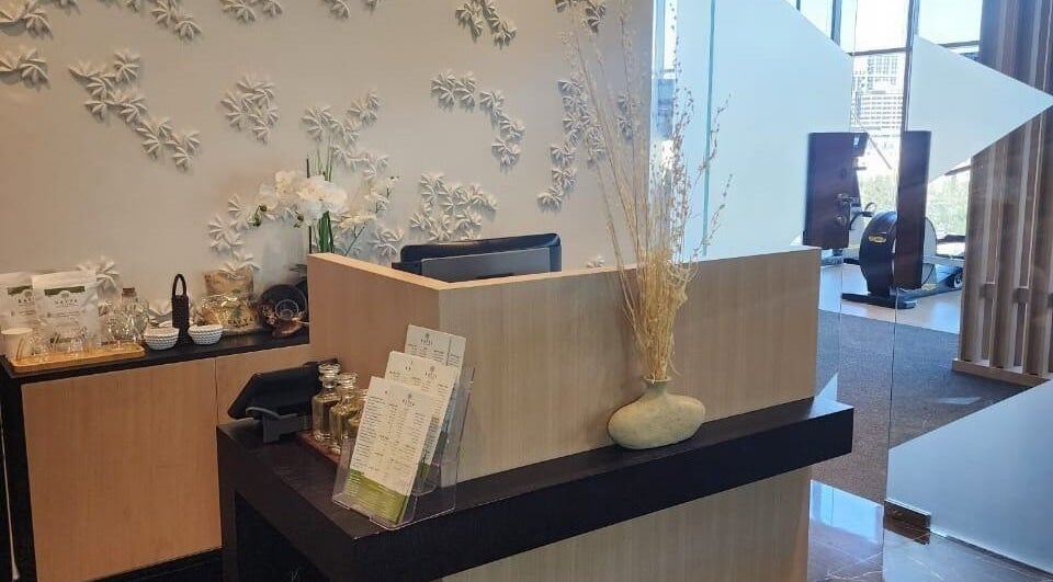 Reception area at Rayya Wellness, Hotel Local in Dubai, AE with elegant decor and a relaxing ambiance.