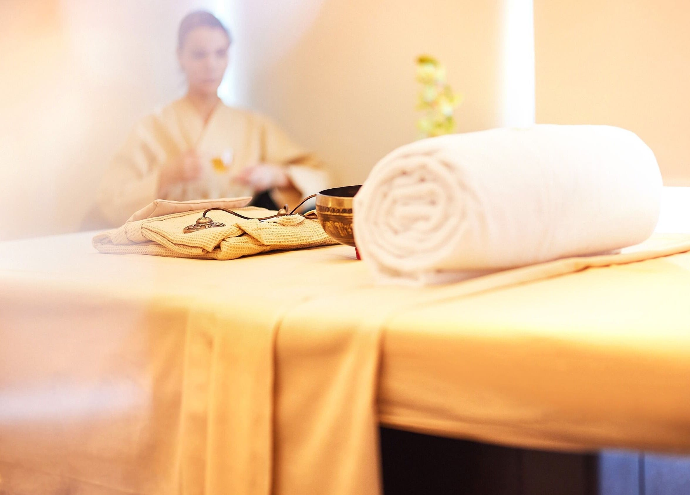 Relaxing spa room at Doubletree by Hilton- Bay Square, Business Bay, Dubai, Dubai, AE, with rolled towels.