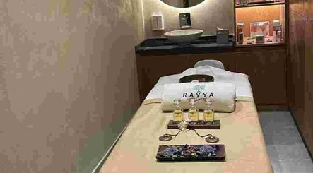 Massage room at Rayya Wellness, Grand Millennium, Business Bay, Dubai, AE, featuring essential oils and calming ambiance.