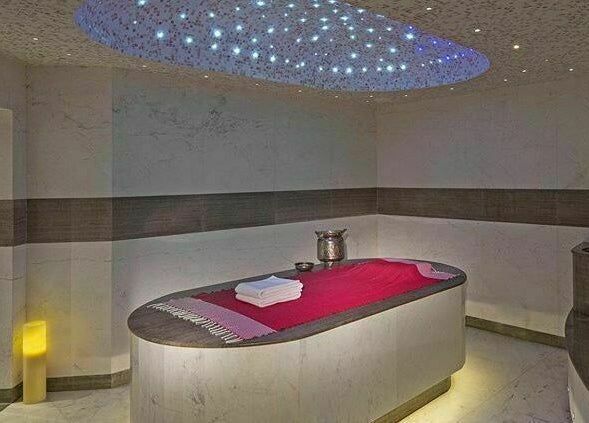 Luxurious spa room at Rayya Wellness, The Retreat Palm Dubai Spa in Dubai, Dubai, AE with star-like ceiling lights.