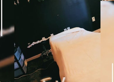 Relaxing massage room at BRiis Wellness @ KB Naturals Beauty located in Cedar Hill, Texas, US, with cozy decor.